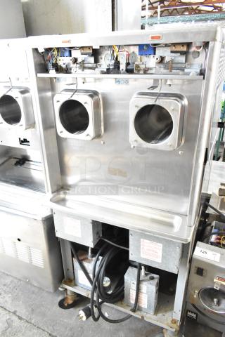 Taylor 342D-27 commercial 2-flavor frozen beverage machine on casters, 208/240V, 1-phase, stainless steel, used condition.