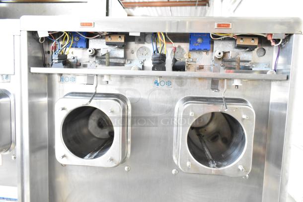 Taylor 342D-27 two-flavor frozen beverage machine with exposed components, stainless steel finish, on commercial casters.