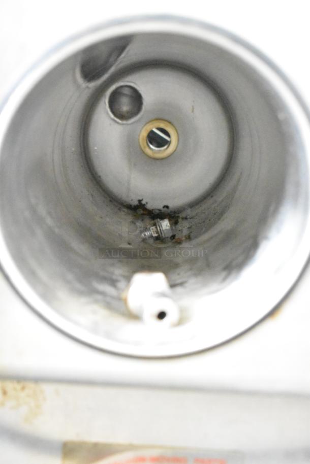 Taylor Commercial Frozen Beverage Machine interior view, showcasing stainless steel chamber. Ideal for single flavor drinks, 115V, 1 phase.