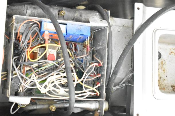 Taylor Commercial Countertop Single Flavor Frozen Beverage Machine, interior wiring view, 115V, 1 phase. Some wear visible.