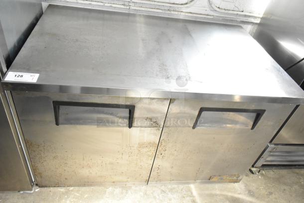 True TUC-48-LP Commercial 2 Door Undercounter Cooler, stainless steel, visible wear, 115 Volts, 1 Phase, model tag visible.