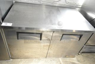 True TUC-48-LP Commercial 2 Door Undercounter Cooler, stainless steel, visible wear, 115 Volts, 1 Phase, model tag visible.