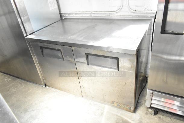 True TUC-48-LP commercial undercounter cooler, 2 doors, stainless steel, 115V, 1 phase, visible wear and rust.