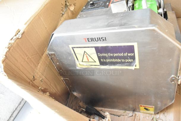 Teruisi YY-MY15 Commercial Countertop Vegetable Cutter. Stainless steel. Includes cautionary label. 110V, 1 phase. In packaging.