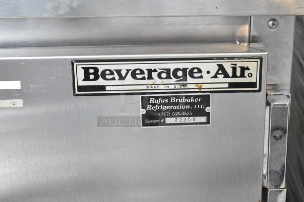 Beverage Air WTF48A 2-door undercounter freezer on casters, 115V, with label showing Rufus Brubaker Refrigeration contact info.