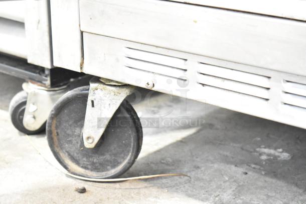 Beverage Air WTF48A 2-door undercounter freezer, shown with commercial casters, 115V, model detail visible.