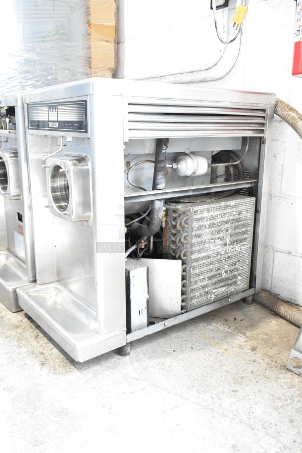 Taylor Commercial Countertop Single Flavor Frozen Beverage Machine, stainless steel, visible coils, in used condition.