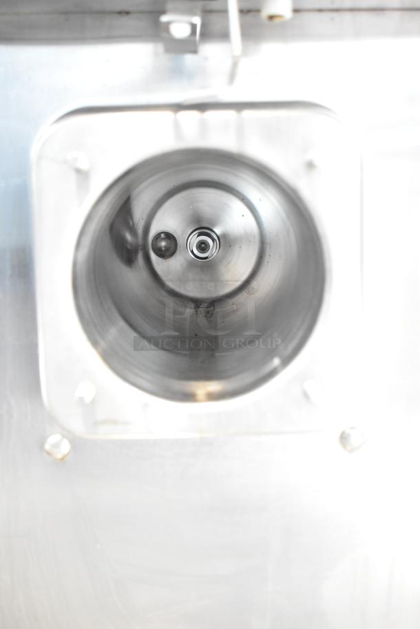 Taylor Commercial Countertop Single Flavor Frozen Beverage Machine, stainless steel, clean interior, durable design.