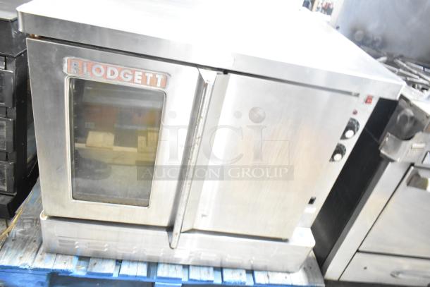 Blodgett commercial full-size convection oven with view-through door, solid door, and thermostatic controls. Brand label visible.