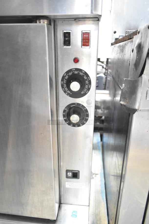 Blodgett commercial full-size convection oven with view-through and solid door, thermostatic controls, silver finish.