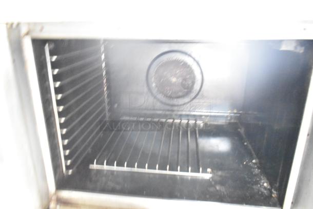 Blodgett commercial full-size convection oven with view-through door, features solid door, thermostatic controls, interior racks.