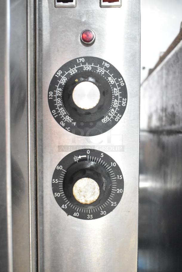 Blodgett commercial convection oven with view-through door, solid door, and thermostatic controls, stainless steel panel.