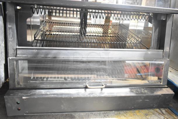 Nemco 6470-SPW Commercial 3 Tier Humidified Display Warmer Merchandiser, 120V, 1 Phase, black with glass doors.