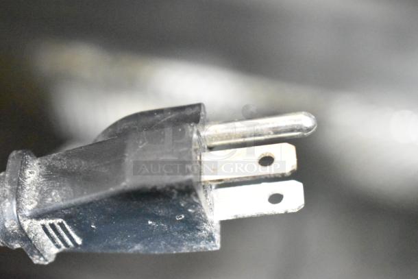 Close-up of a three-prong plug for Nemco 6470-SPW commercial display warmer, 120 Volts, 1 Phase.