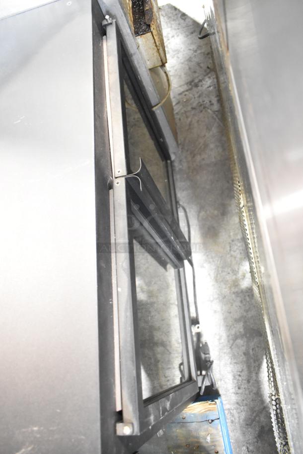 Nemco 6470-SPW Commercial 3-Tier Humidified Display Warmer, 120V, 1 Phase, in good condition, showing exterior and power cord.