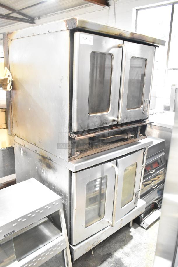Montague commercial gas convection oven pair with view-through doors and thermostatic controls. Used condition.