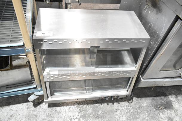 Hatco commercial countertop 2-tier warming display case merchandiser, stainless steel, "Caution - Hot" label, in good condition.