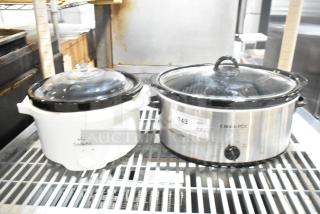 Two slow cookers: Rival 3950 (white) and Crock Pot SCV803-SS (stainless steel). Both feature glass lids, 120V, 1 phase. Good condition.