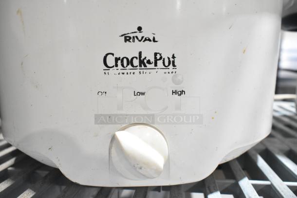 Two slow cookers including Rival 3950, showing control dial with "Off," "Low," and "High" settings. Used condition.