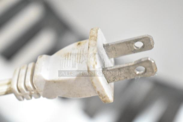 Plug of Rival 3950 or Crock Pot SCV803-SS slow cooker shown close-up. 120 Volts, 1 Phase.