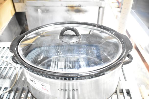 Two slow cookers: Rival 3950 and Crock Pot SCV803-SS, 120V, 1-phase, in good condition with visible heating elements.