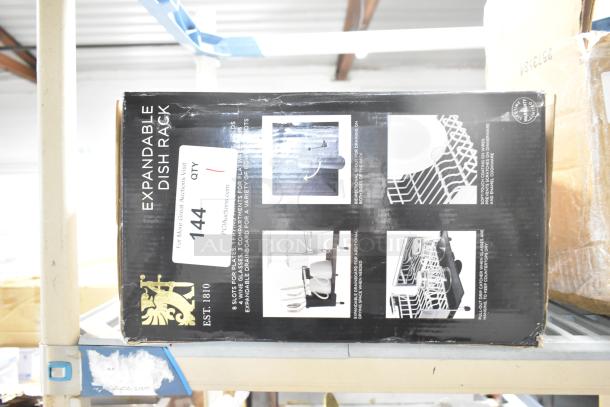 Boxed Sabatier Expandable Dish Rack. Brand new with minor scratches. Features indicated on box; includes drainage system.