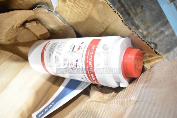 Elkay water filter replacement cartridge in box; red cap, installation instructions visible.