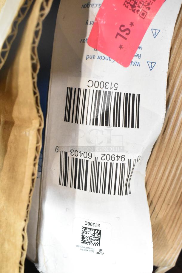 Cardboard packaging with visible barcodes and a pink label. Contains water filter cartridge and Aladdin Temp-Rite trays.