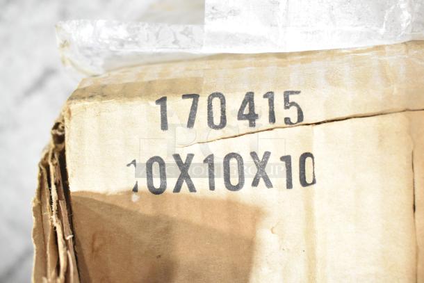 Cardboard box with markings "170415" and "10X10X10." Contains water filter cartridge and Aladdin Temp-Rite trays.