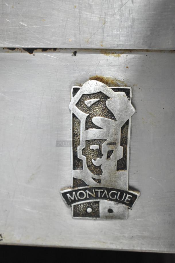 Montague C36SHB Legend commercial broiler, natural gas, 42,000 BTU, with casters. Stainless steel, visible logo emblem.