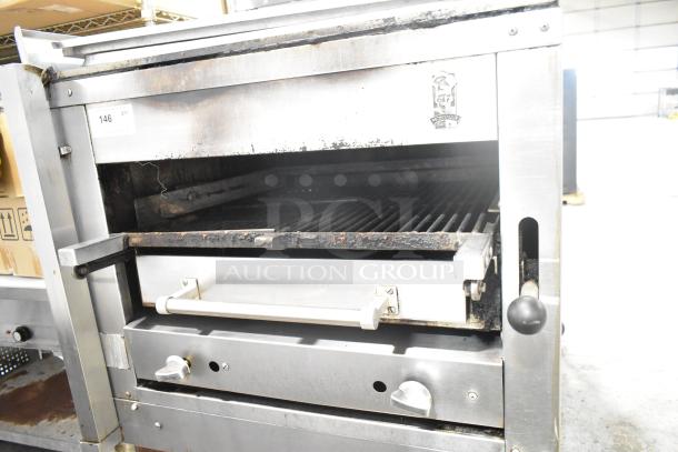 Montague C36SHB Legend commercial steakhouse broiler, natural gas, 42,000 BTU, used condition, on commercial casters.