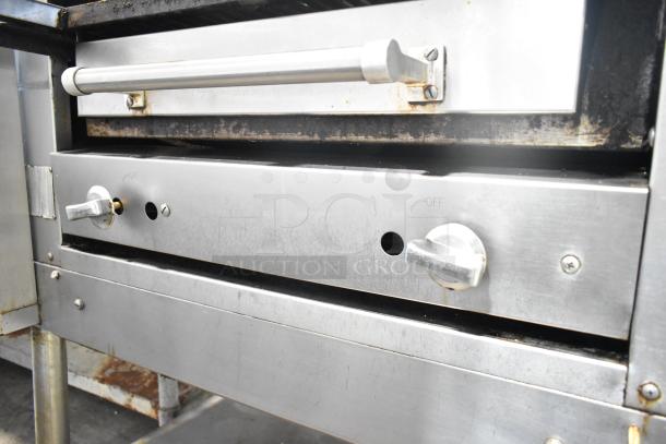 Montague C36SHB Legend commercial steakhouse broiler, natural gas, 42,000 BTU, on casters. Stainless steel, used condition.