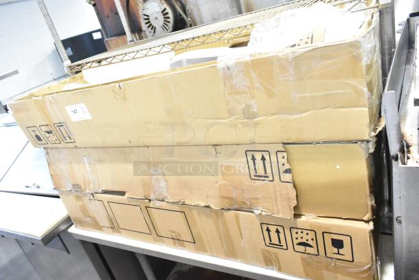 Three Midmark 6282-001 Shroud Kits in cardboard boxes, brand new with visible handling wear on packaging.