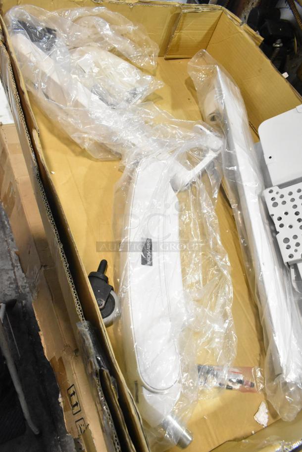 Three brand new Midmark 6282-001 Shroud Kits in original packaging, partially visible and placed in a cardboard box.