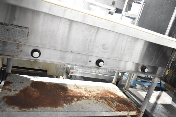 Eagle DHT3-120 commercial 3-bay steam table, electric, wire over shelf, 120V, 1 Phase, visible wear, model label shown.