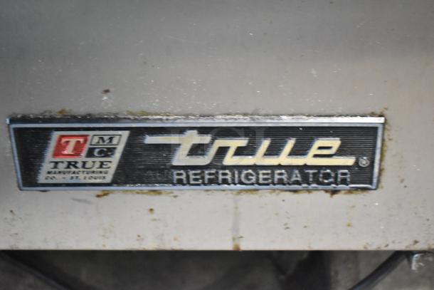 True TSSU-72-30M-B-ST prep table logo. Features "True Refrigerator" branding. Some wear visible.