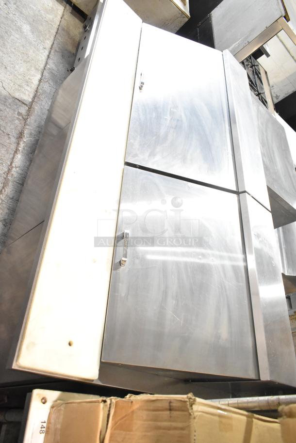 True TSSU-72-30M-B-ST commercial sandwich prep table, stainless steel, with casters, in used condition.