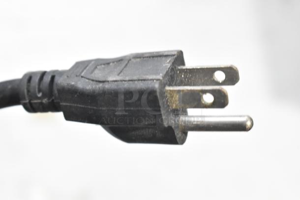 Alt text: Close-up of a standard three-prong power plug for the Vevor NB-B23 Electric Steam Food Warmer.