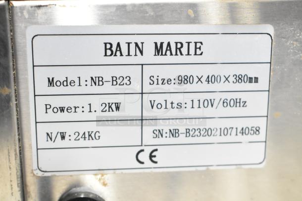 Vevor NB-B23 Commercial Electric Steam Food Warmer label details. Model NB-B23, 1.2KW, 110V, size 980x400x380mm.