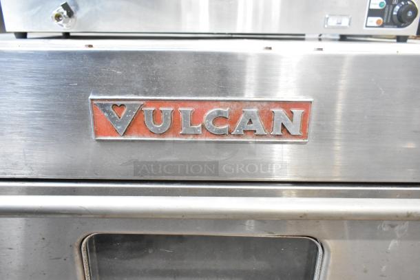 Vulcan V008-T commercial electric pizza oven, stainless steel, single deck, 208 volts, visible Vulcan logo on front.