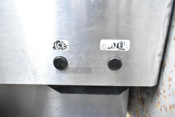 Hoshizaki DCM-300BAH icemaker's control panel with "ICE" and "WATER" labels. Stainless steel finish, good condition.
