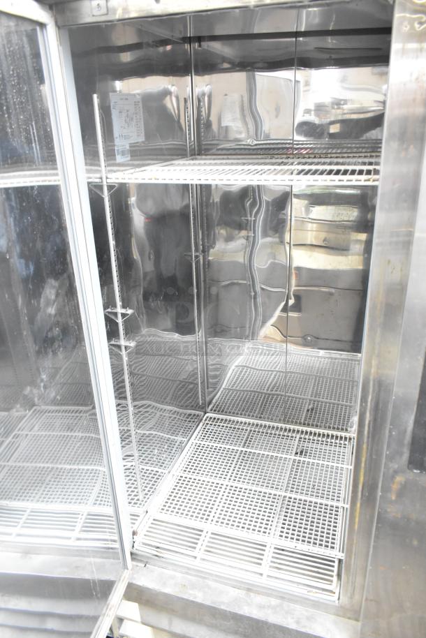 Coldline CFD-2RR-E-HC 2 Door Commercial Cooler, stainless steel interior, 115V, 1 phase, adjustable shelves, excellent condition.