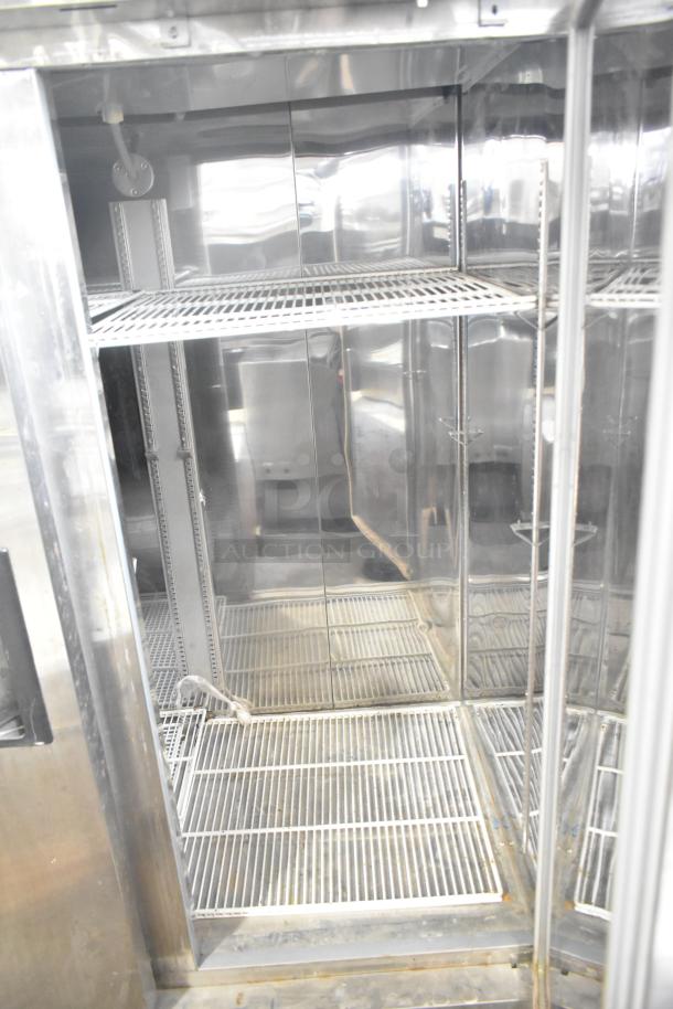 Coldline CFD-2RR-E-HC commercial 2-door reach-in cooler with stainless steel interior and wire shelving, 115V, 1 phase.
