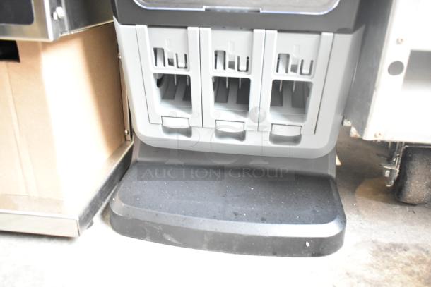 Georgia Pacific Dixie Ultra Countertop 3 Well Dispenser, model Z-100274-01, in gray, excellent condition, sturdy base.