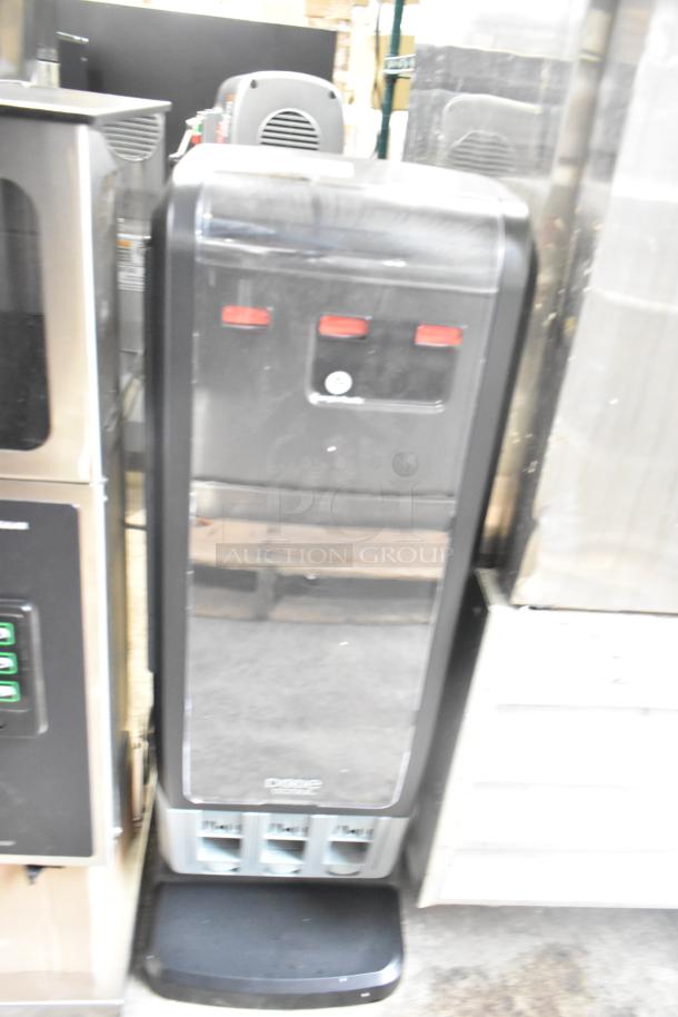 Georgia Pacific Z-100274-01 Dixie Ultra 3 Well Dispenser in used condition, with visible brand logo on the front panel.