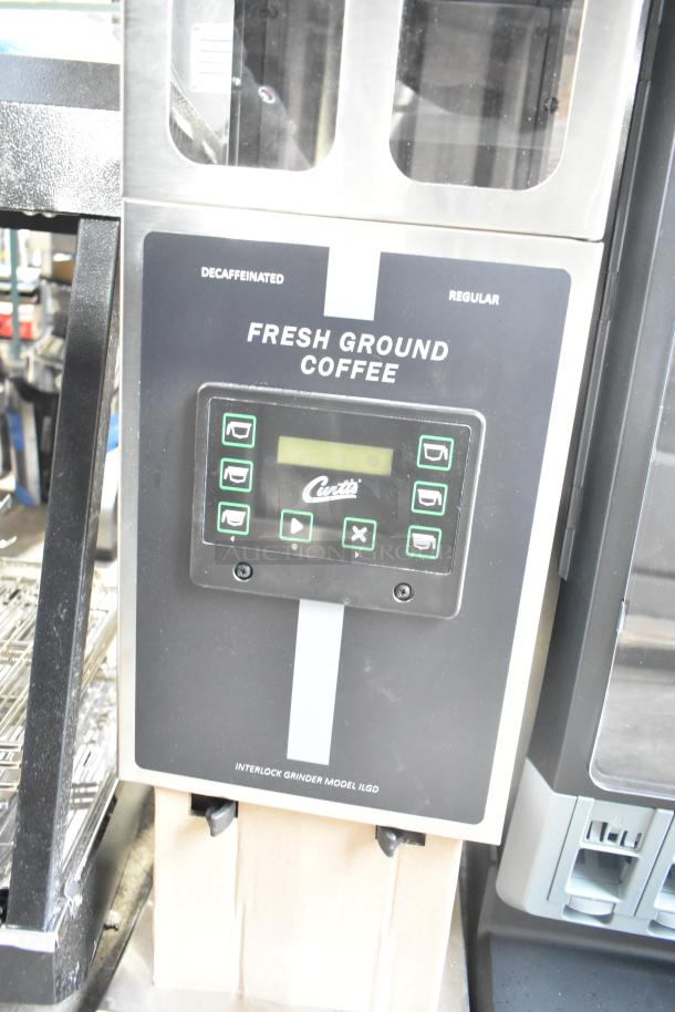 Brand new Curtis ILGD-10 commercial coffee grinder, twin 7.5 lb capacity, 120 volts, minor scratches. Digital controls shown.