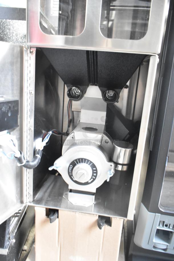 Brand new Curtis ILGD-10 commercial twin 7.5 lb. coffee grinder, 120 volts, with a coarse-to-fine adjustment dial.