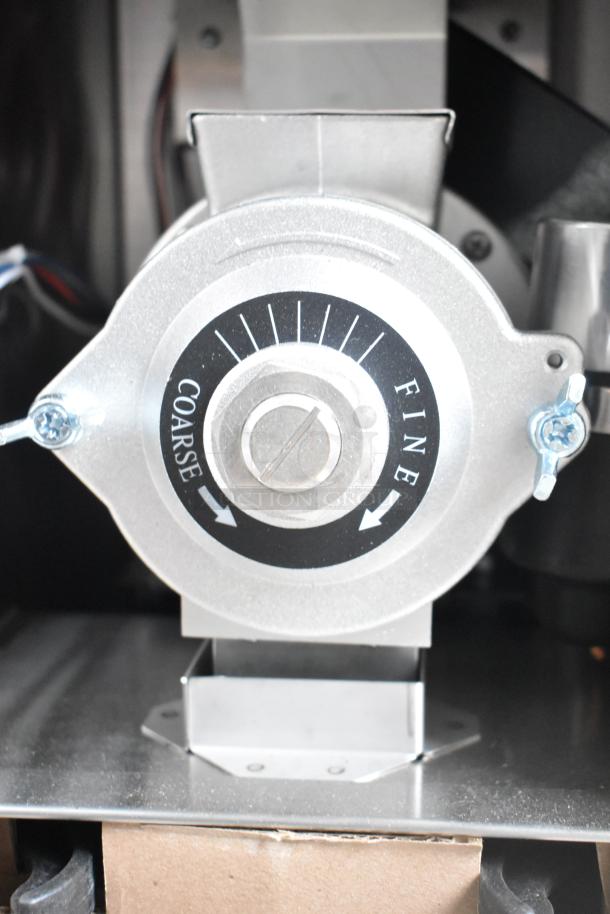 Brand new Curtis ILGD-10 commercial coffee grinder, 120V, showing grind settings from coarse to fine.