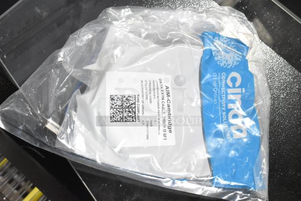 AIM-Cambridge data extension cable, DB9M, 6ft, packaged in plastic with QR code and RoHS compliant label.