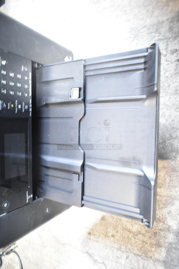 Epson WF-7840 countertop scanner copier printer, 100-120V, 1 phase, black finish, keypad visible, excellent condition.